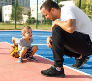 Father Son Playing Together Basketball Field